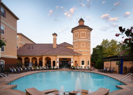 Pool area and exterior facade of Fountain View Property