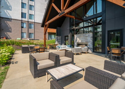 Clubhouse exterior with outdoor fireplace