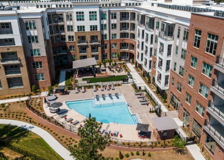 Apartment building and pool area aerial view