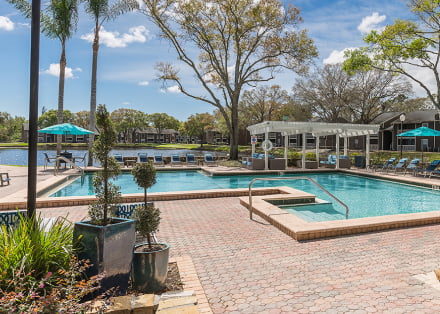 Apartment complex exterior located near pond